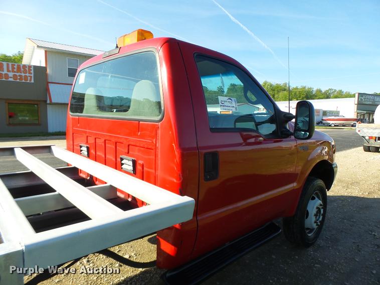 image for item DA3480 1999 Ford F550 Super Duty rollback truck