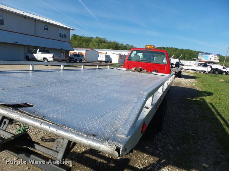 image for item DA3480 1999 Ford F550 Super Duty rollback truck