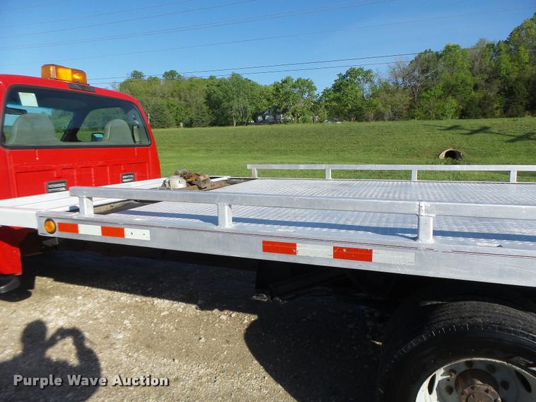 image for item DA3480 1999 Ford F550 Super Duty rollback truck