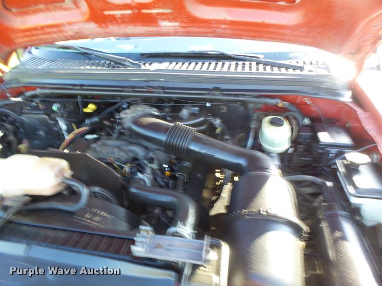 image for item DA3480 1999 Ford F550 Super Duty rollback truck