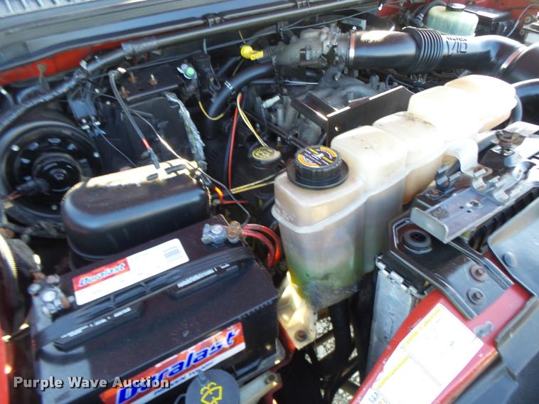 image for item DA3480 1999 Ford F550 Super Duty rollback truck