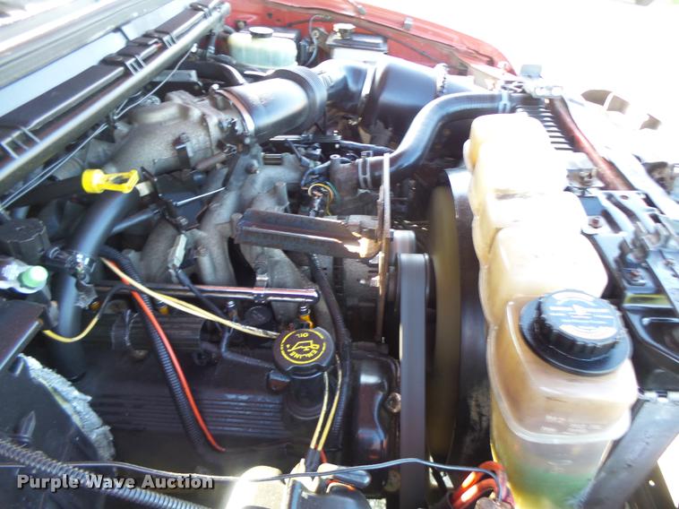 image for item DA3480 1999 Ford F550 Super Duty rollback truck