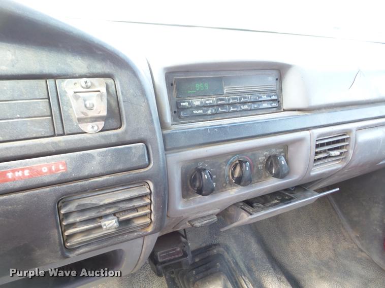 image for item DA6312 1997 Ford F350 Crew Cab flatbed pickup truck