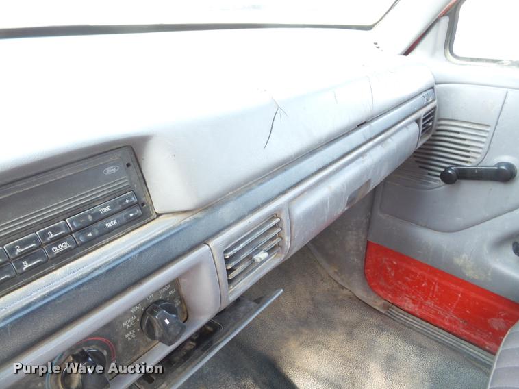 image for item DA6312 1997 Ford F350 Crew Cab flatbed pickup truck