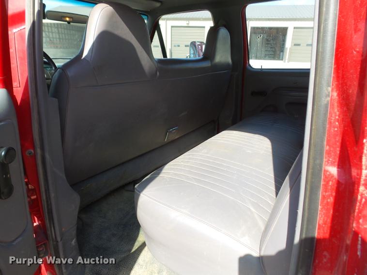 image for item DA6312 1997 Ford F350 Crew Cab flatbed pickup truck