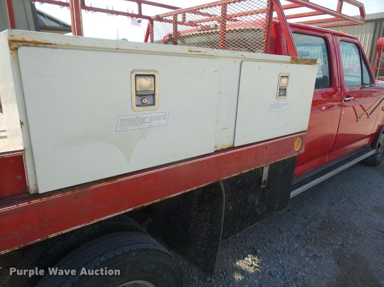 image for item DA6312 1997 Ford F350 Crew Cab flatbed pickup truck