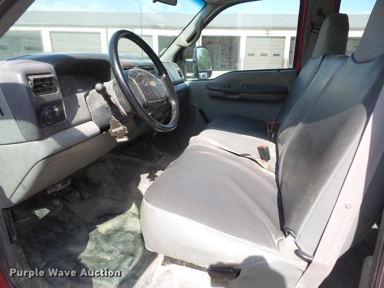 image for item DA6313 1999 Ford F350 Super Duty Crew Cab flatbed pickup truck