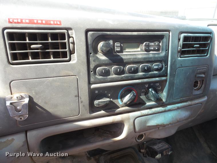 image for item DA6313 1999 Ford F350 Super Duty Crew Cab flatbed pickup truck