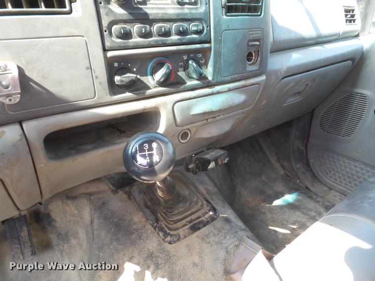 image for item DA6313 1999 Ford F350 Super Duty Crew Cab flatbed pickup truck