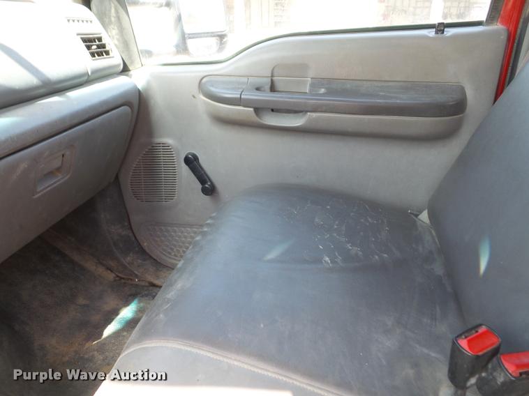 image for item DA6313 1999 Ford F350 Super Duty Crew Cab flatbed pickup truck