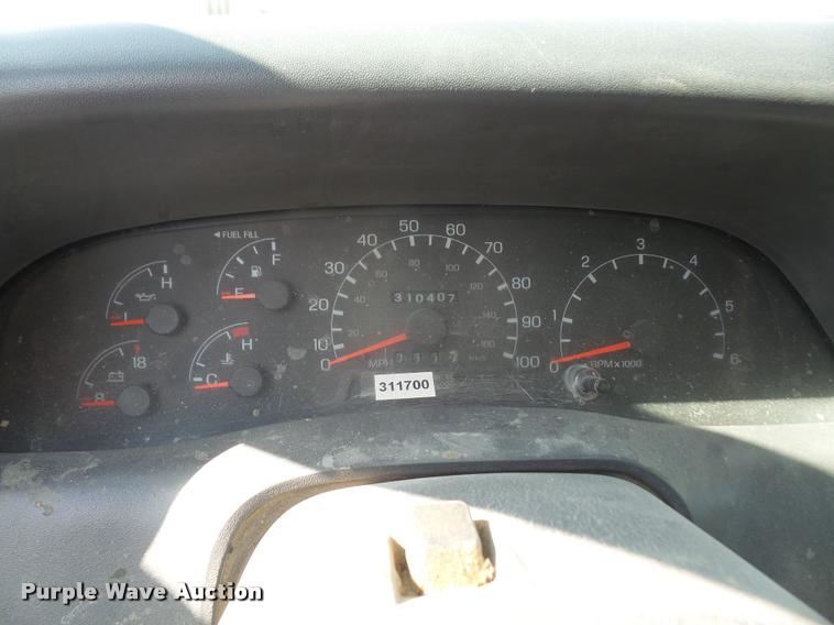 image for item DA6313 1999 Ford F350 Super Duty Crew Cab flatbed pickup truck