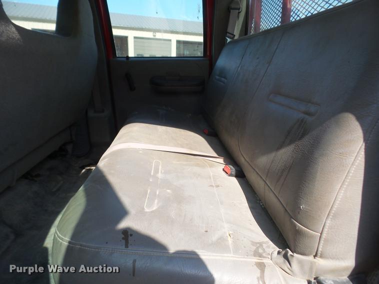 image for item DA6313 1999 Ford F350 Super Duty Crew Cab flatbed pickup truck