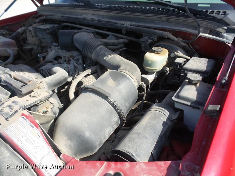 image for item DA6313 1999 Ford F350 Super Duty Crew Cab flatbed pickup truck