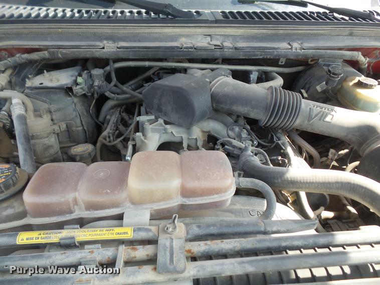 image for item DA6313 1999 Ford F350 Super Duty Crew Cab flatbed pickup truck