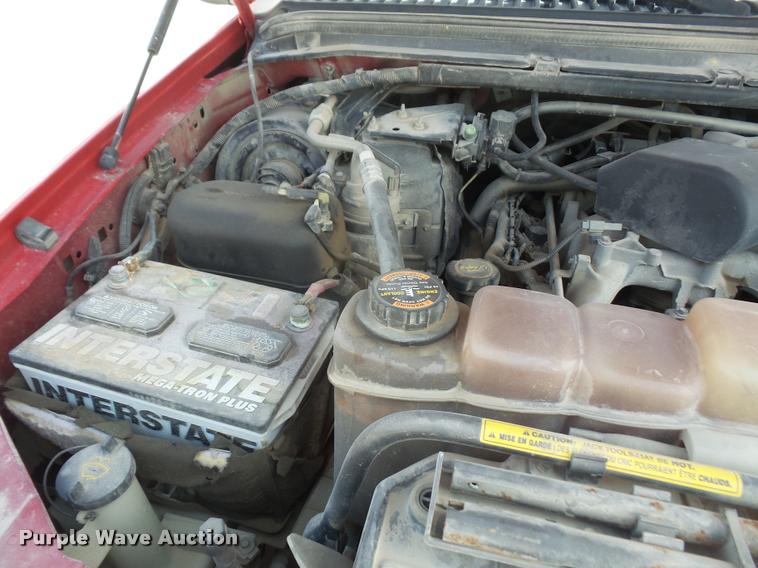 image for item DA6313 1999 Ford F350 Super Duty Crew Cab flatbed pickup truck