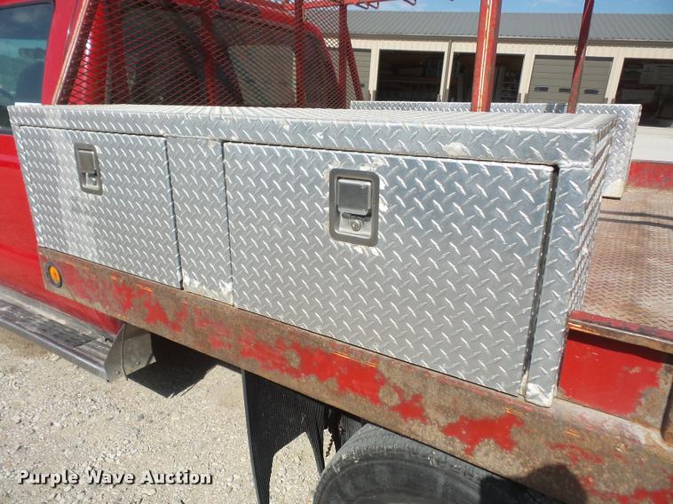 image for item DA6313 1999 Ford F350 Super Duty Crew Cab flatbed pickup truck