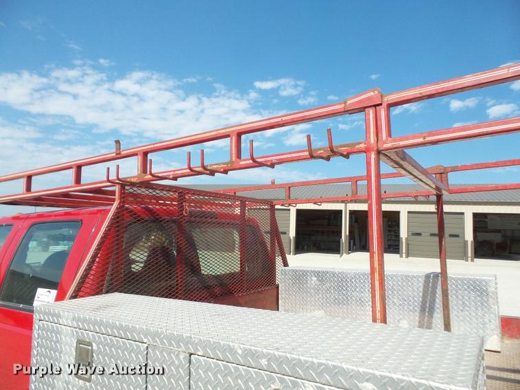 image for item DA6313 1999 Ford F350 Super Duty Crew Cab flatbed pickup truck