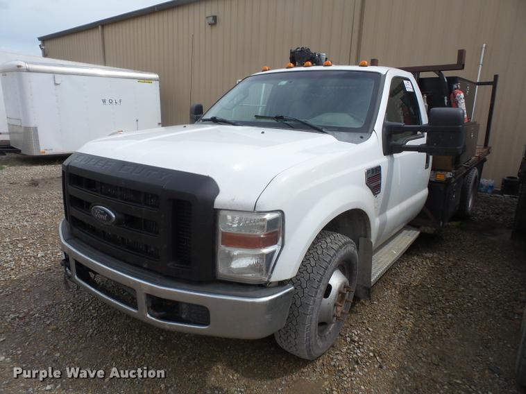 image for item DA8230 2008 Ford F350 Super Duty flatbed pickup truck with crane