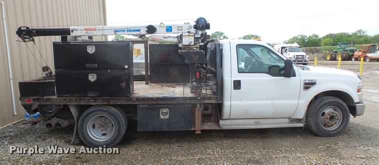 image for item DA8230 2008 Ford F350 Super Duty flatbed pickup truck with crane