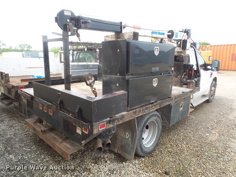 image for item DA8230 2008 Ford F350 Super Duty flatbed pickup truck with crane