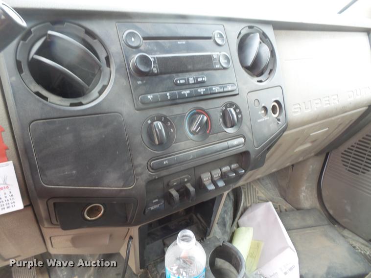 image for item DA8230 2008 Ford F350 Super Duty flatbed pickup truck with crane