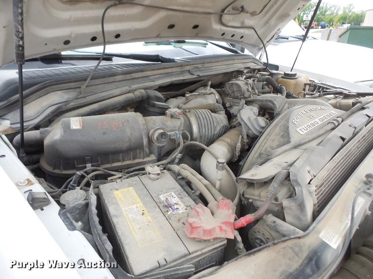 image for item DA8230 2008 Ford F350 Super Duty flatbed pickup truck with crane