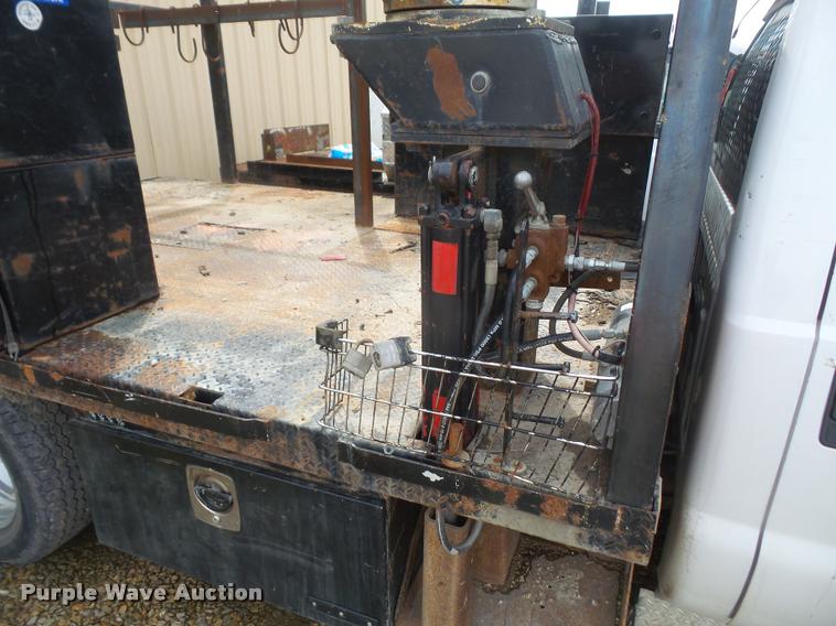 image for item DA8230 2008 Ford F350 Super Duty flatbed pickup truck with crane