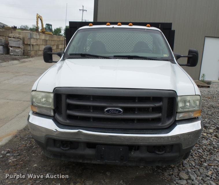 image for item DD9470 2003 Ford F350 flatbed pickup truck