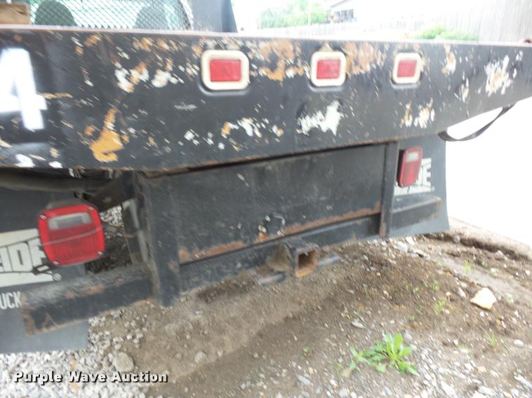image for item DD9470 2003 Ford F350 flatbed pickup truck