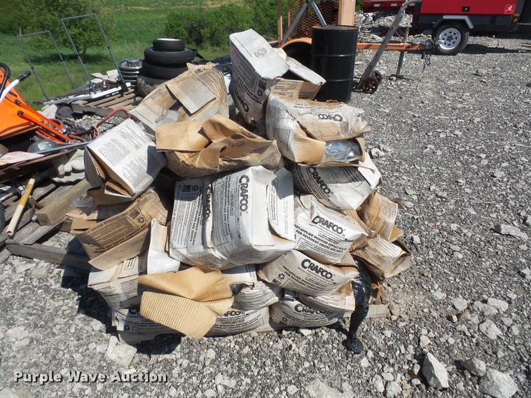 image for item DL9697 Approximately 50 boxes of Crafco Roadsaver 514 crack seal filler