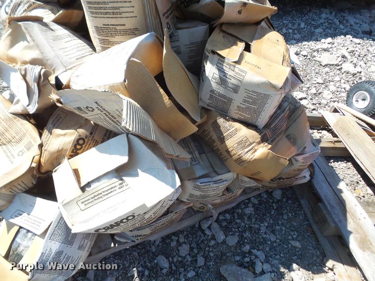 image for item DL9697 Approximately 50 boxes of Crafco Roadsaver 514 crack seal filler