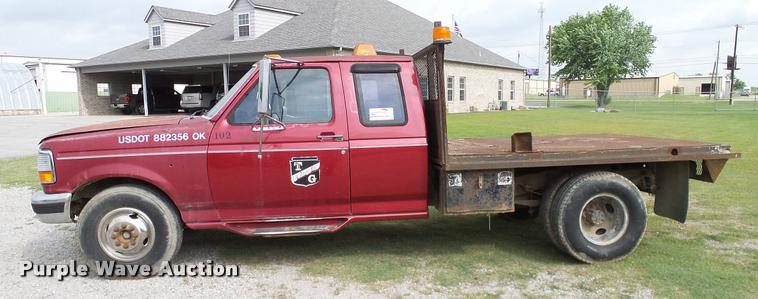 image for item L3134 1995 Ford F350 SuperCab flatbed pickup truck