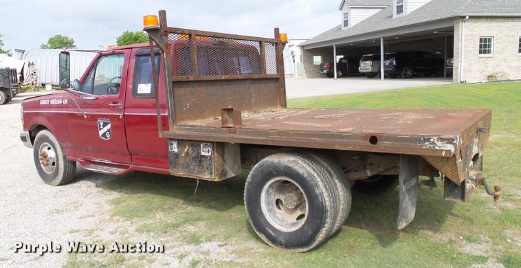 image for item L3134 1995 Ford F350 SuperCab flatbed pickup truck