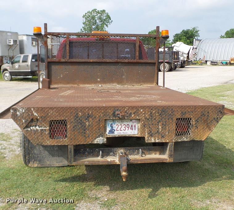 image for item L3134 1995 Ford F350 SuperCab flatbed pickup truck