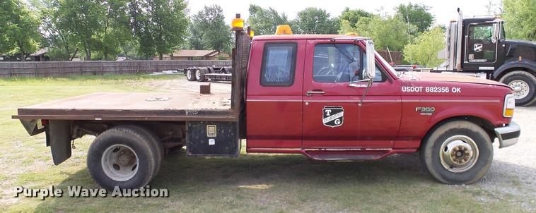 image for item L3134 1995 Ford F350 SuperCab flatbed pickup truck