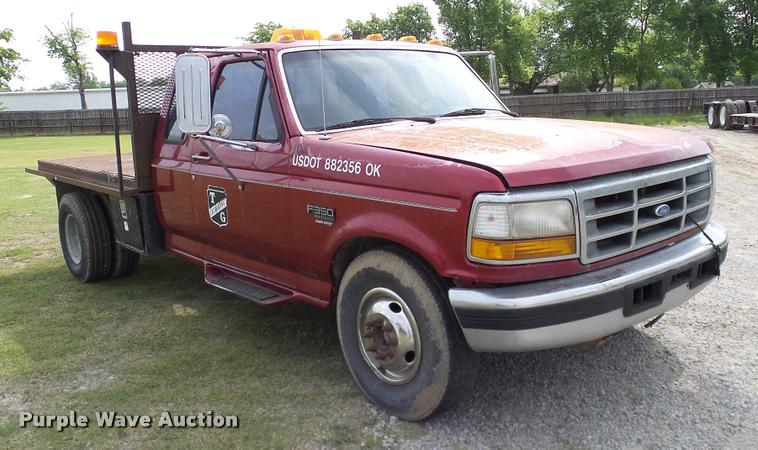 image for item L3134 1995 Ford F350 SuperCab flatbed pickup truck
