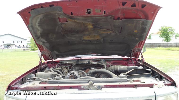 image for item L3134 1995 Ford F350 SuperCab flatbed pickup truck