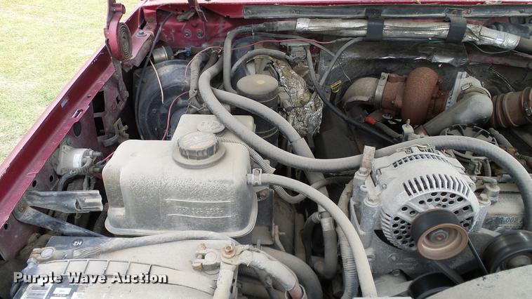 image for item L3134 1995 Ford F350 SuperCab flatbed pickup truck