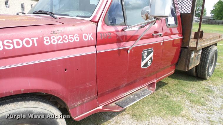 image for item L3134 1995 Ford F350 SuperCab flatbed pickup truck