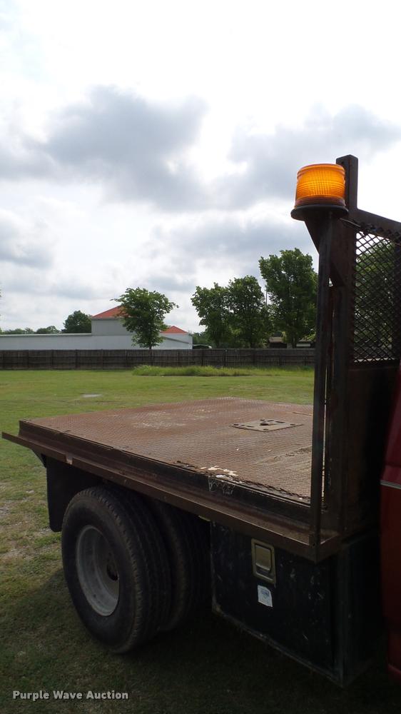 image for item L3134 1995 Ford F350 SuperCab flatbed pickup truck