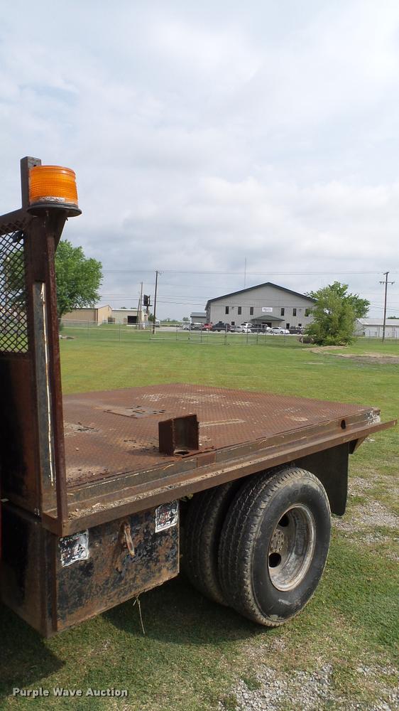 image for item L3134 1995 Ford F350 SuperCab flatbed pickup truck