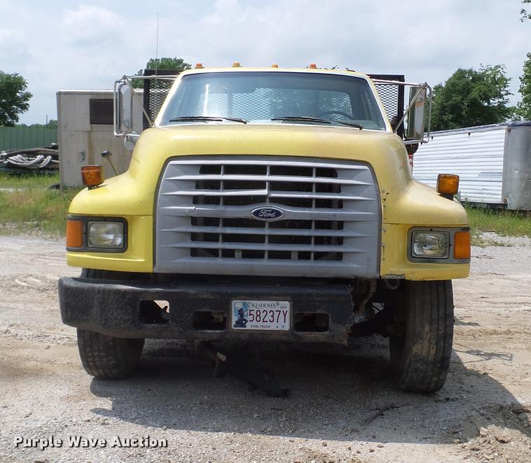 image for item L3146 1998 Ford F700 dump flatbed truck