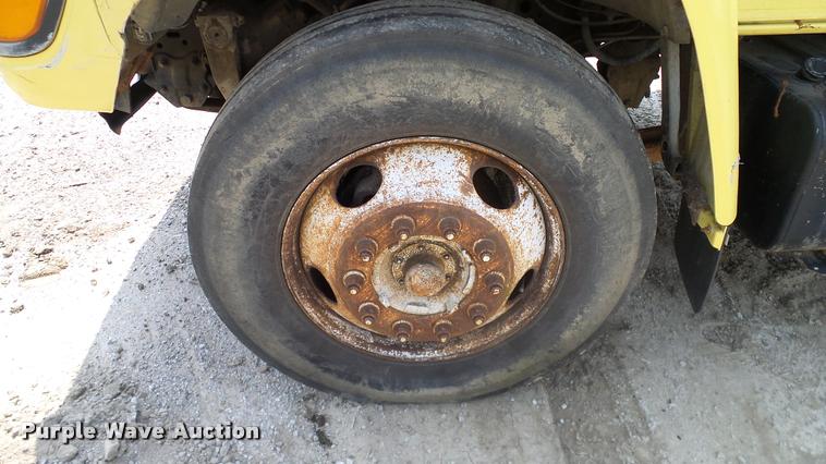 image for item L3146 1998 Ford F700 dump flatbed truck