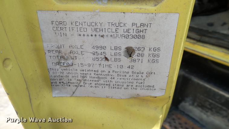 image for item L3146 1998 Ford F700 dump flatbed truck