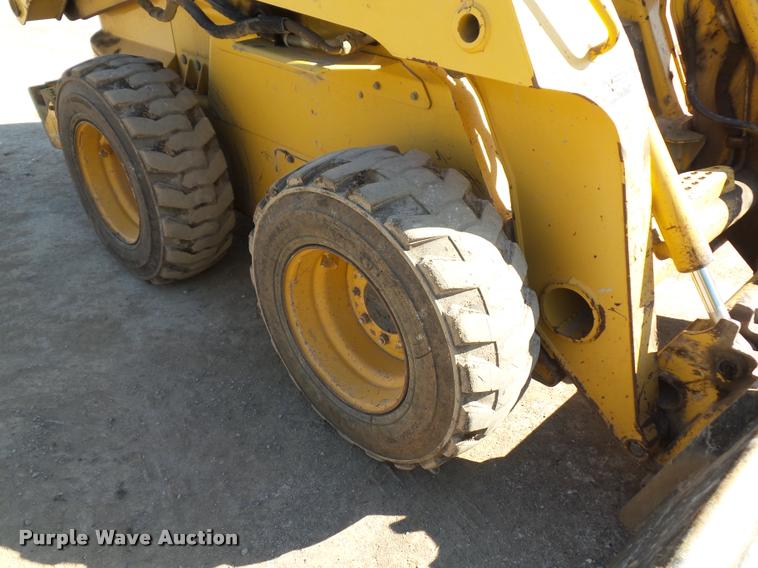 image for item DD9432 2000 John Deere 260 skid steer