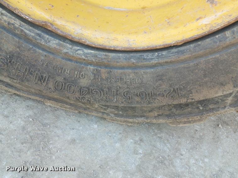 image for item DD9432 2000 John Deere 260 skid steer