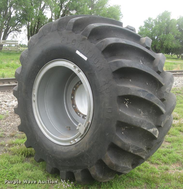 image for item AR9868 Firestone 73x44.00-32 floater tire and wheel