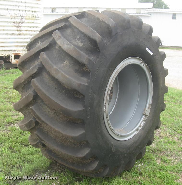 image for item AR9868 Firestone 73x44.00-32 floater tire and wheel