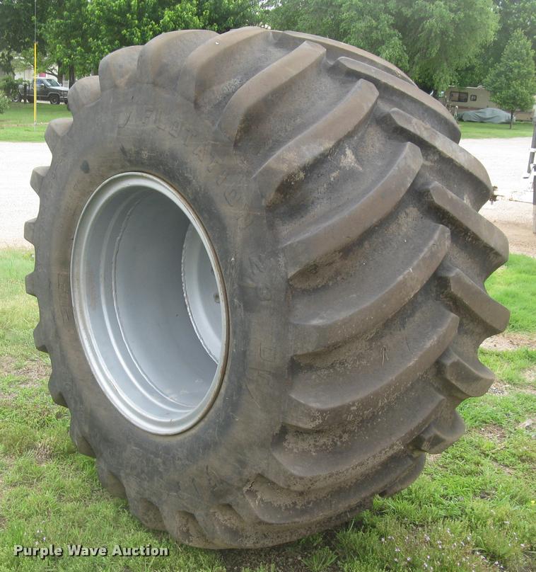 image for item AR9868 Firestone 73x44.00-32 floater tire and wheel