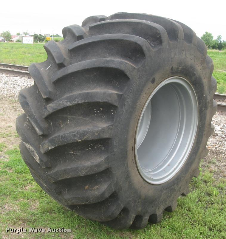 image for item AR9868 Firestone 73x44.00-32 floater tire and wheel